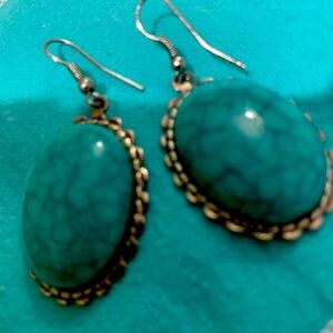 Absolutely stunning torques like silver style earrings. Must have for diva!